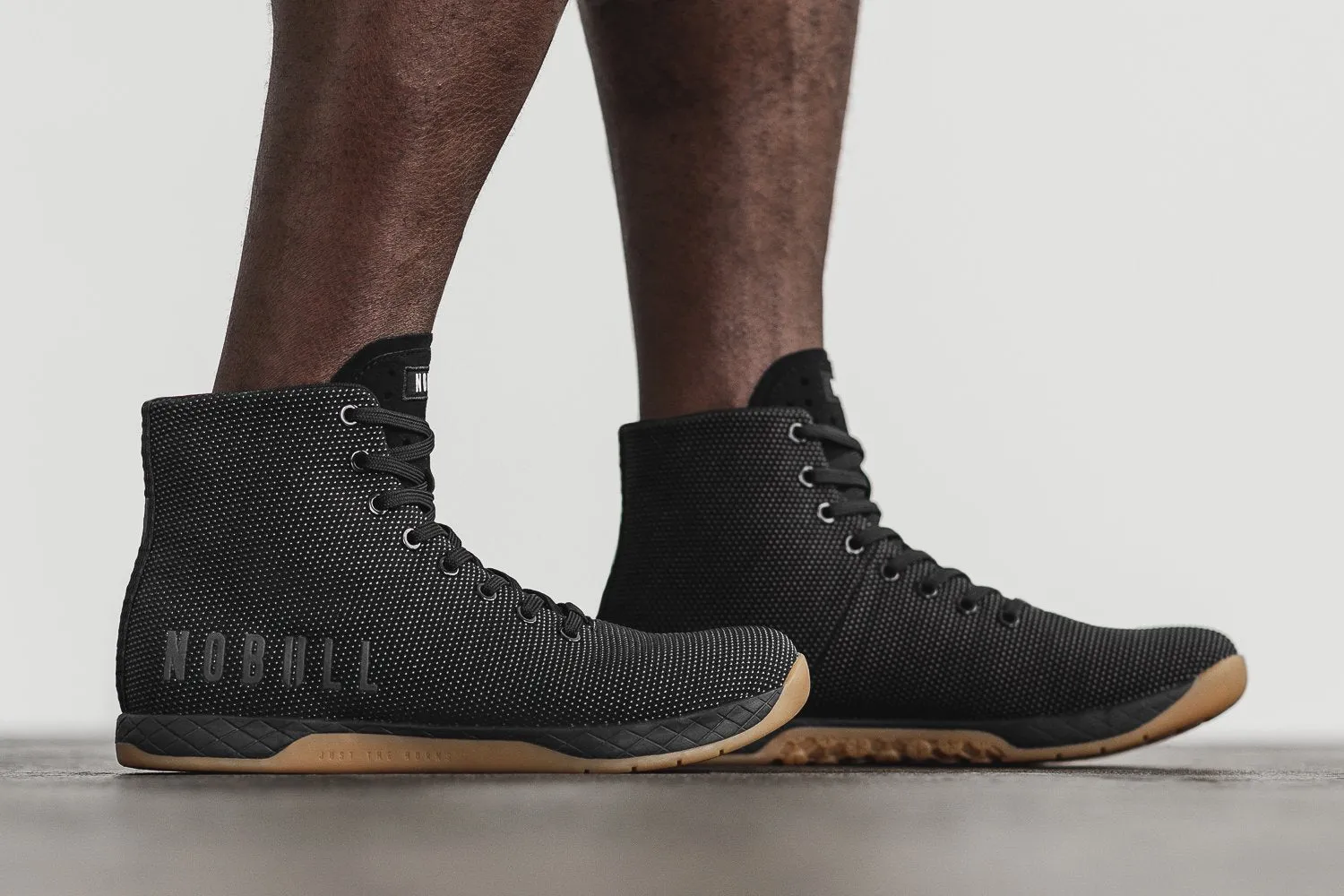 HIGH-TOP BLACK GUM TRAINER (MEN'S)